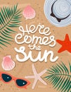 Here comes the Sun card or banner handwritten on a sandy beach background Royalty Free Stock Photo